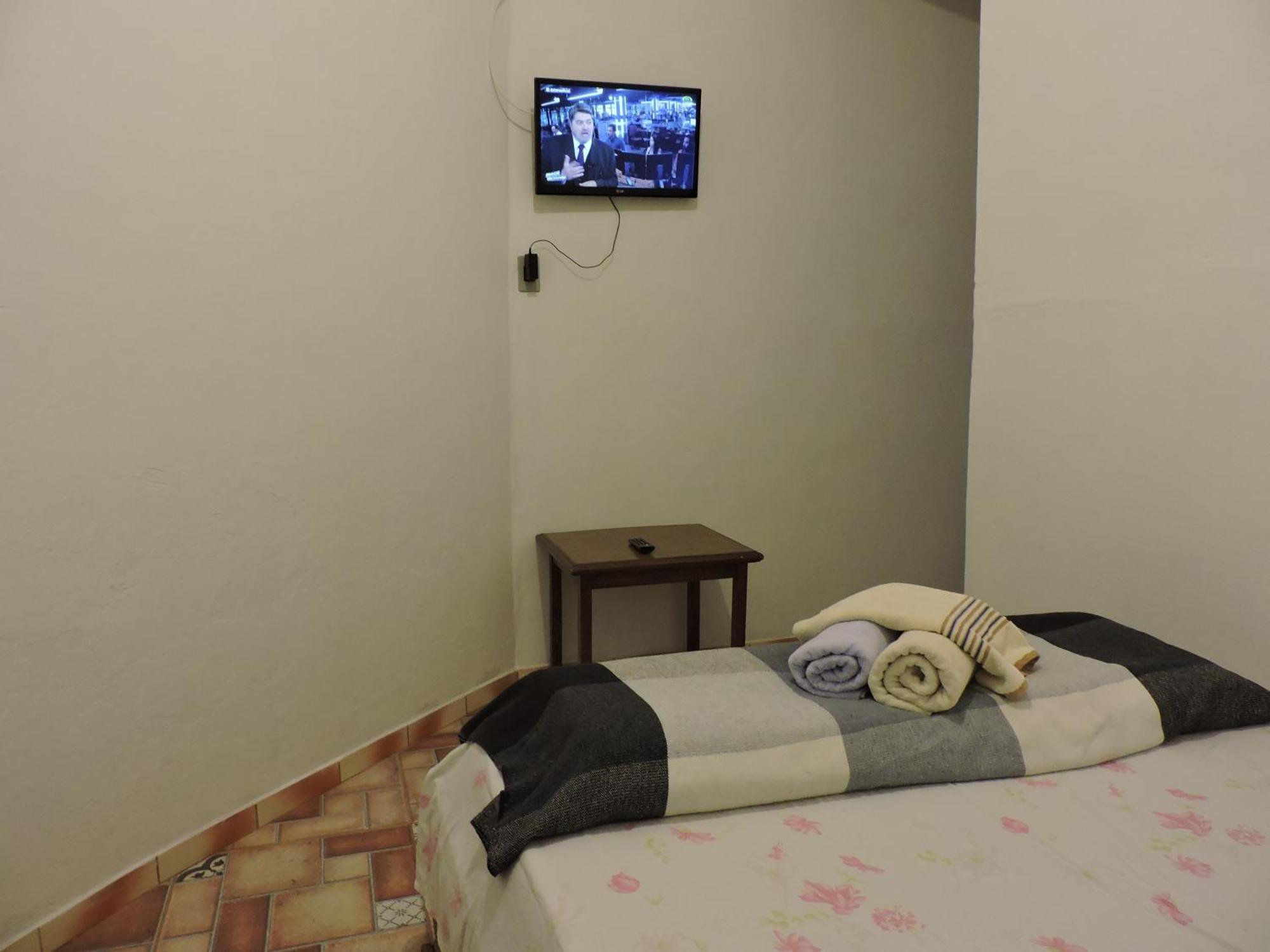 Pousada Casa Da Serra Sao Tome das Letras Bilik gambar